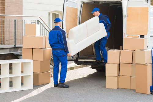 Cowley office relocation service with desks, boxes, and equipment
