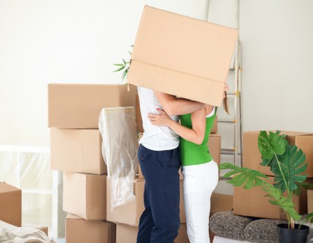 Packing boxes and furniture ready for a moving van