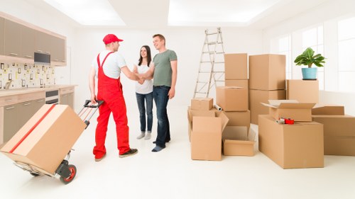 Careful labelling and boxing of household items for relocation